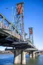 Lifting truss Hawthorne bridge with two towers across the Willamette River in the center of Portland Oregon Royalty Free Stock Photo