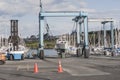 lifts for ships on the marina with a boat on one of them Royalty Free Stock Photo