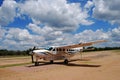 A light aircraft on an airstrip ferrying tourists to and from remote safari lodges in Tanzania