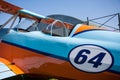 Light aircraft, modern biplane orange and blue Royalty Free Stock Photo