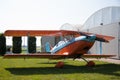 Light aircraft, modern biplane orange and blue