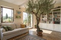 Interior of light living room with sofa, olive tree and shelf units Royalty Free Stock Photo