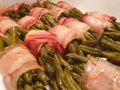 A buffet of string beans wrapped in bacon. Royalty Free Stock Photo