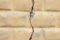 Light background. Large wide crack on brick wall Royalty Free Stock Photo