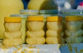 Bashkir honey in plastic jars in the shape of a bear stands on a trading table