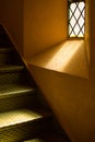 Light beams into a stairway Royalty Free Stock Photo