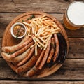 Light beer with grilled sausages. Oktoberfest menu Royalty Free Stock Photo