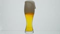 Light beer overflowing glass from glass in super slow motion close up. Hop drink