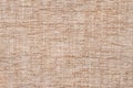 Light beige background of soft, fleecy cloth. Texture of textile closeup Royalty Free Stock Photo