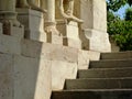 Beige color porous sand stone sculpture and building detail with stairs, light and shadow. Royalty Free Stock Photo