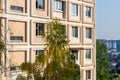 Light beige facade of a residential building Royalty Free Stock Photo