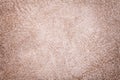 Light beige fluffy background of soft, fleecy cloth. Texture of textile closeup Royalty Free Stock Photo