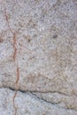 Light beige sandstone with brown crack close up background texture