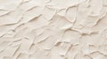 Light beige textured background creates a dynamic surface with highlights and shadows, forming an abstract pattern resembling Royalty Free Stock Photo