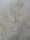 A light beige textured surface with subtle variations and a slightly chalky appearance offers a neutral and adaptable backdrop for Royalty Free Stock Photo