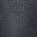 Light black skin, with figures of irregular shape and veins. Leather texture