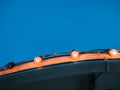 Light blubs on the roof edge. Royalty Free Stock Photo