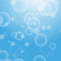 Light blue abstract background with a bokeh in the form of circles. Underwater world with air bubbles. Vector illustration