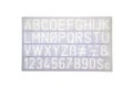 Light blue alphabet stencil lettering PVC plastic ruler template Royalty Free Stock Photo