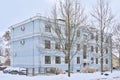 Apartment building along a snow covered street in Tartu Royalty Free Stock Photo