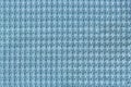 Light blue background from soft fleecy fabric close up. Texture of textiles macro Royalty Free Stock Photo