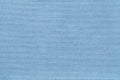 Light blue background from a textile material with wicker pattern, closeup. Royalty Free Stock Photo