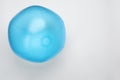 Light blue beach ball on white background, top view. Space for text Royalty Free Stock Photo