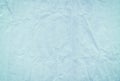 Light blue blank crumpled and grungy textured paper background Royalty Free Stock Photo