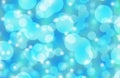 Light blue bokeh abstract background/bokeh background in different tones of blue Royalty Free Stock Photo