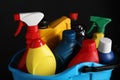 Light blue bucket with car cleaning products on black background, closeup Royalty Free Stock Photo