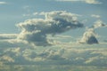 Light blue clouds illuminated by the sun. The concept of air travel around the world Royalty Free Stock Photo