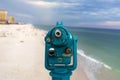 Light blue coin operated telescope mounted on the Pensacola fishing pier Royalty Free Stock Photo