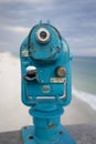Light blue coin operated telescope mounted on the Pensacola fishing pier Royalty Free Stock Photo