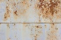 Light blue corroded metal background. Rusty and scratched painted metal wall. Rusty metal background with streaks of rust Royalty Free Stock Photo