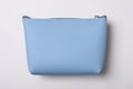 Light blue cosmetic bag isolated on white, top view Royalty Free Stock Photo