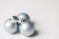 Light blue cosmic balls for Christmas decoration on white background.