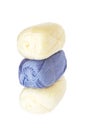 Light blue and cream coloured balls of acrylic thread isolated o Royalty Free Stock Photo