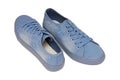 Light blue footwear, textile sneakers are on white background Royalty Free Stock Photo