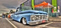 Light blue Ford pick up truck