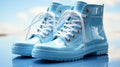 Light blue galoshes on a blue background Royalty Free Stock Photo
