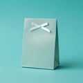 Light Blue Gift Bag with White Bow Royalty Free Stock Photo
