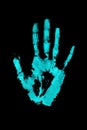 Light blue human hand print on black background isolated close up, handprint illustration, palm and fingers silhouette mark