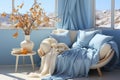 Light blue interior, couch, white and blue blankets and pillows, vases by the window and desert view Royalty Free Stock Photo
