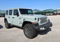 Light blue Jeep Wrangler Sahara in show outside the official dealership