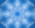 Light blue kaleidoscope background pattern looking like snowflake. Christmas concept