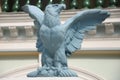 A light blue painted eagle stone statue Royalty Free Stock Photo