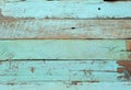 Light blue painted old planks texture background. Wall texture background with peeling old paint. Royalty Free Stock Photo