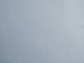 Light blue painted plaster wall background with brush marks texture Royalty Free Stock Photo