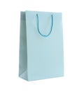 Light blue paper shopping bag isolated Royalty Free Stock Photo