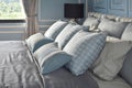 Light blue pillows in difference pattern with classic style bedding Royalty Free Stock Photo